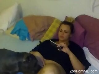 Big booty woman lets the dog lick her pussy and ass